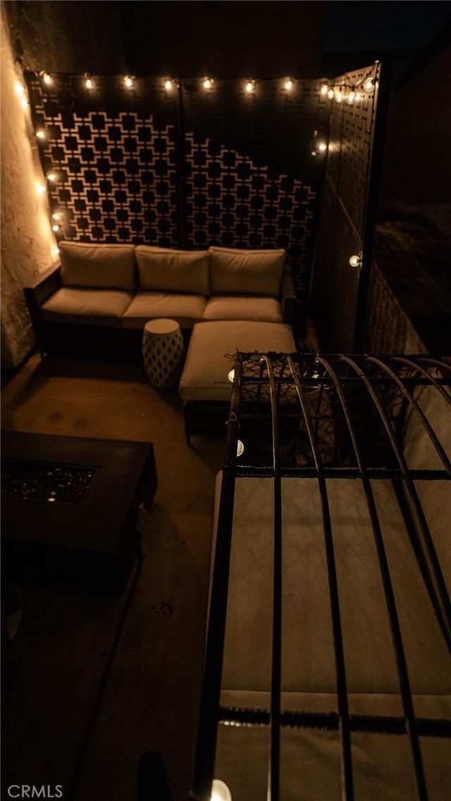 5310 Zelzah Ave Unit 312, Encino, CA 91316 - patio at night featuring an outdoor hangout area