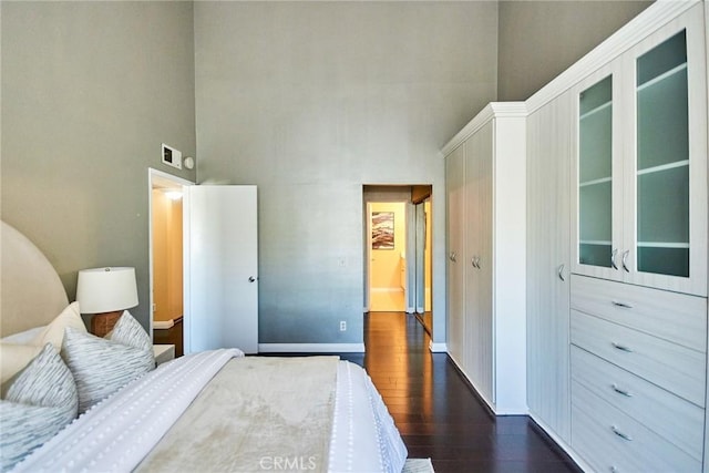 1116 Cleghorn Dr Unit B, Diamond Bar, CA 91765 - bedroom with a towering ceiling and dark wood-style flooring