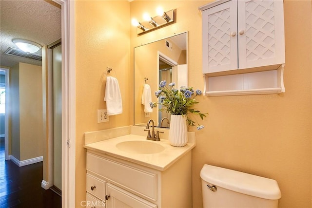 1116 Cleghorn Dr Unit B, Diamond Bar, CA 91765 - bathroom with vanity, wood finished floors, and a textured ceiling