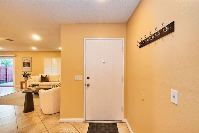 1116 Cleghorn Dr Unit B, Diamond Bar, CA 91765 - entryway featuring light tile patterned floors and a textured ceiling