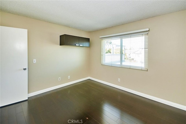 1116 Cleghorn Dr Unit B, Diamond Bar, CA 91765 - unfurnished room with dark wood finished floors and a textured ceiling