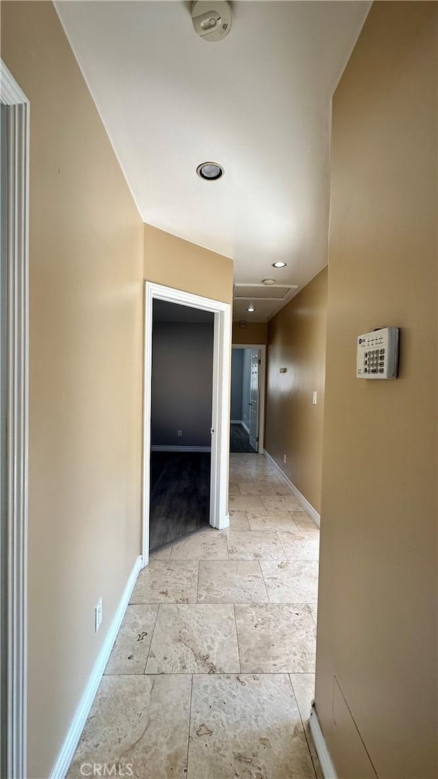 9206 Elizabeth Ave, South Gate, CA 90280 - hallway featuring stone tile floors and recessed lighting