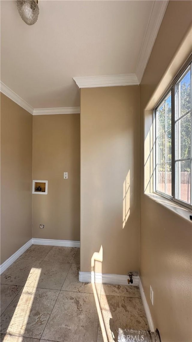 9206 Elizabeth Ave, South Gate, CA 90280 - washroom featuring washer hookup, ornamental molding, and light tile patterned floors