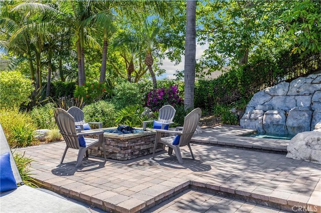 21210 Twin Oak, Yorba Linda, CA 92886 - view of patio / terrace featuring an outdoor fire pit