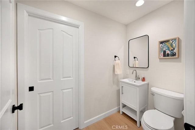21210 Twin Oak, Yorba Linda, CA 92886 - half bath featuring vanity, wood finished floors, and recessed lighting