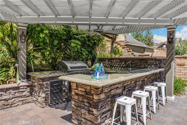 21210 Twin Oak, Yorba Linda, CA 92886 - view of patio / terrace with an outdoor bar, area for grilling, a pergola, and ceiling fan