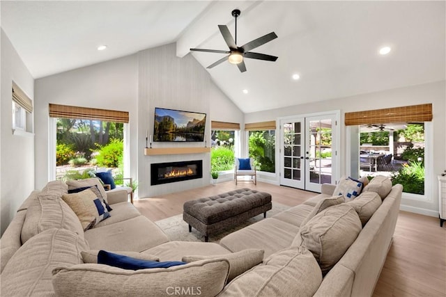 21210 Twin Oak, Yorba Linda, CA 92886 - living area featuring high vaulted ceiling, ceiling fan, a glass covered fireplace, beam ceiling, and recessed lighting