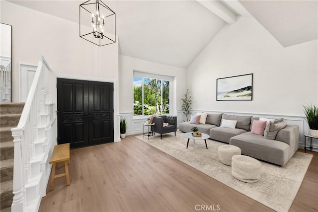 21210 Twin Oak, Yorba Linda, CA 92886 - living area with high vaulted ceiling, beam ceiling, light wood finished floors, stairway, and a wainscoted wall