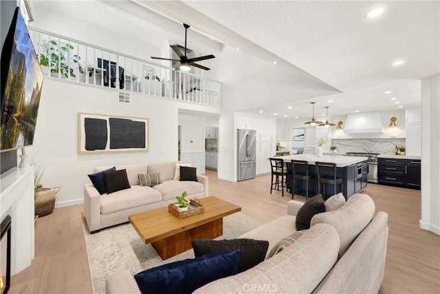 21210 Twin Oak, Yorba Linda, CA 92886 - living room with ceiling fan, light wood-type flooring, and recessed lighting