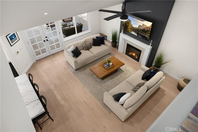 21210 Twin Oak, Yorba Linda, CA 92886 - living room featuring wood finished floors, ceiling fan, and a glass covered fireplace