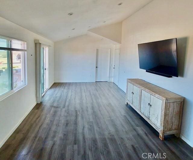 56133 Jesse Rd, Landers, CA 92285 - unfurnished living room with lofted ceiling and dark wood-type flooring