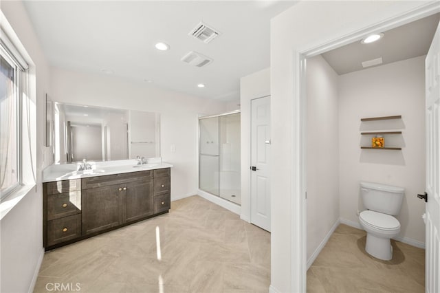 28426 Joey Ct, Menifee, CA 92585 - bathroom with double vanity, a stall shower, recessed lighting, and tile patterned floors