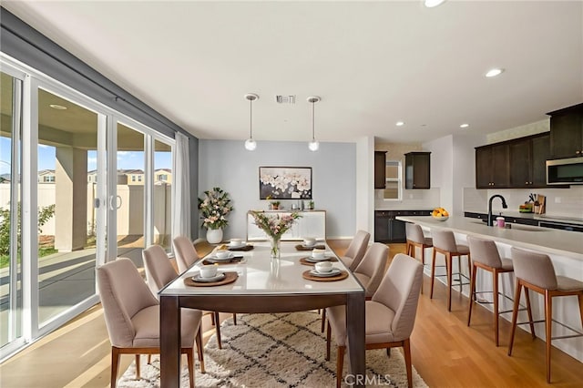 28426 Joey Ct, Menifee, CA 92585 - dining space featuring recessed lighting and light wood-style floors