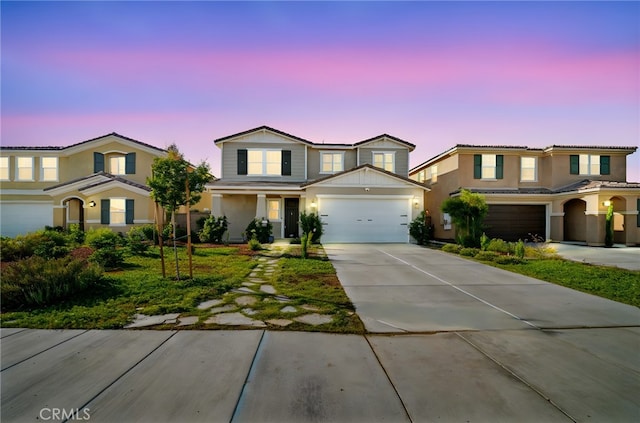 28426 Joey Ct, Menifee, CA 92585 - view of front facade featuring driveway, stucco siding, and a garage