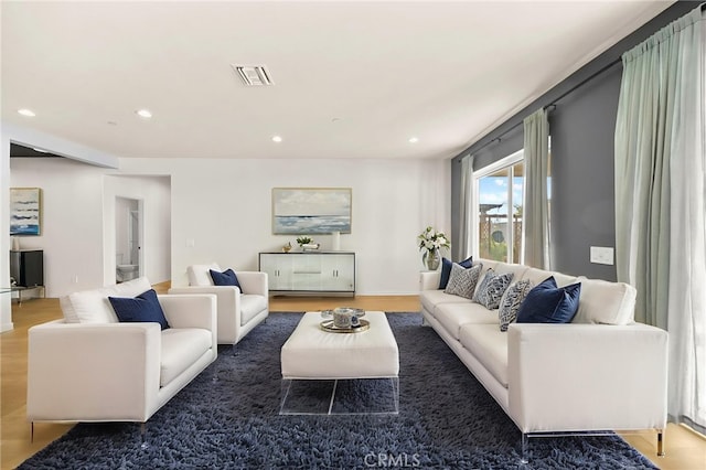 28426 Joey Ct, Menifee, CA 92585 - living room with wood finished floors and recessed lighting
