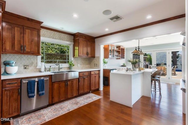 3626 Saint Elizabeth Rd, Glendale, CA 91206 - kitchen featuring stainless steel dishwasher, crown molding, light countertops, french doors, and dark wood-style flooring