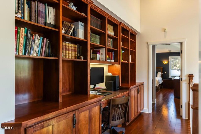 3626 Saint Elizabeth Rd, Glendale, CA 91206 - home office with dark wood-type flooring and built in study area