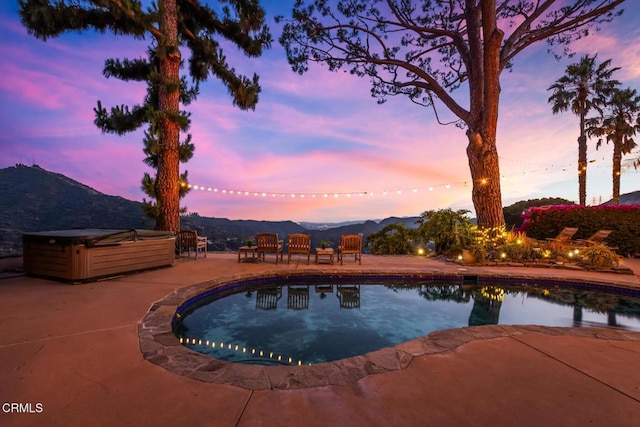 3626 Saint Elizabeth Rd, Glendale, CA 91206 - outdoor pool with a hot tub, a patio area, and a mountain view