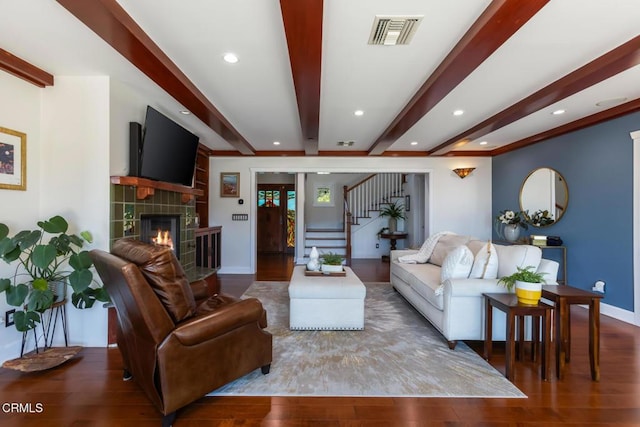 3626 Saint Elizabeth Rd, Glendale, CA 91206 - living area with beamed ceiling, a fireplace, stairs, wood finished floors, and recessed lighting