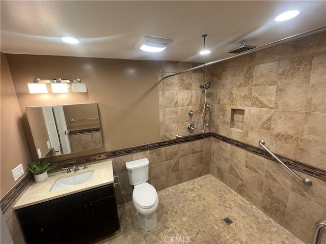 124 Tangelo Unit 390, Irvine, CA 92618 - bathroom featuring vanity, a tile shower, and tile walls