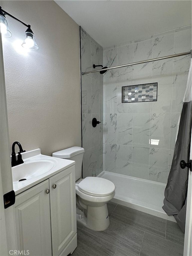 2311 5th St, Riverside, CA 92507 - bathroom with vanity and a tile shower