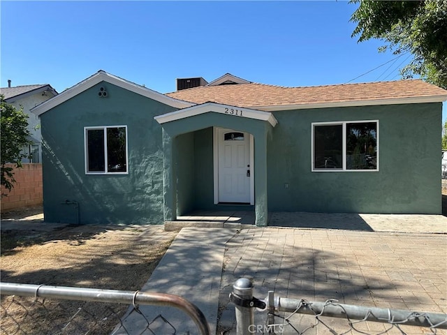 2311 5th St, Riverside, CA 92507 - view of front of home featuring stucco siding and a shingled roof