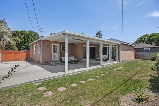 6515 Amigo Ave, Reseda, CA 91335 - rear view of house with entry steps, a patio, and stucco siding