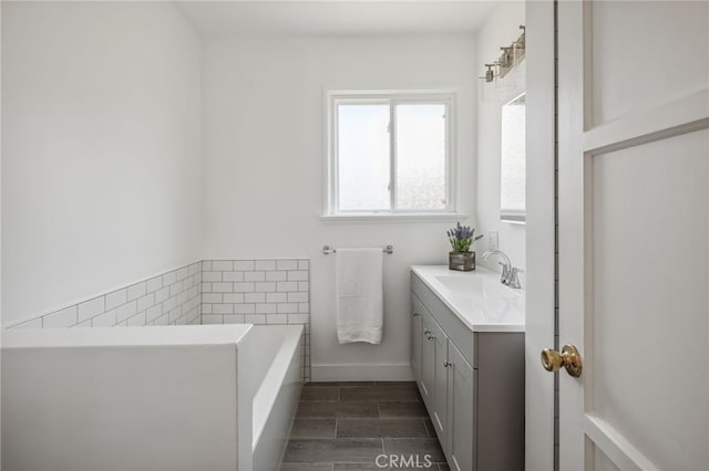 6515 Amigo Ave, Reseda, CA 91335 - full bath featuring vanity, a bath, and wood finish floors