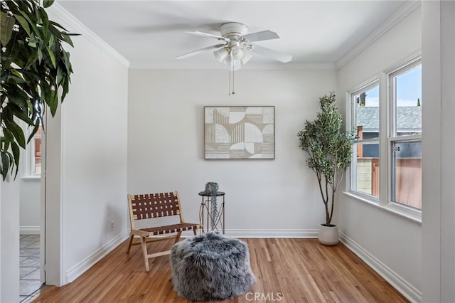 6515 Amigo Ave, Reseda, CA 91335 - sitting room featuring light wood-style flooring, plenty of natural light, a ceiling fan, and ornamental molding