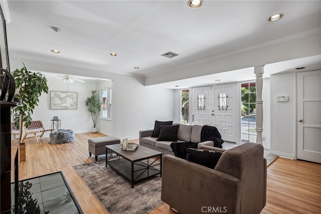 6515 Amigo Ave, Reseda, CA 91335 - living room with healthy amount of natural light, ornamental molding, ceiling fan, wood finished floors, and decorative columns