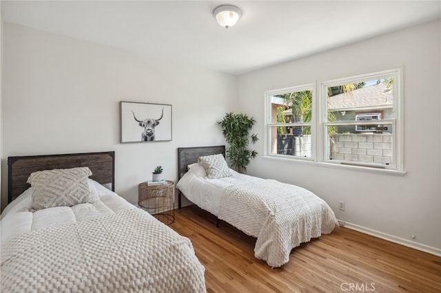 6515 Amigo Ave, Reseda, CA 91335 - bedroom with wood finished floors and baseboards