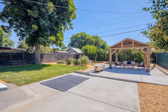 1396 N Ferger Ave, Fresno, CA 93728 - fenced backyard with a gazebo, outdoor lounge area, and a patio