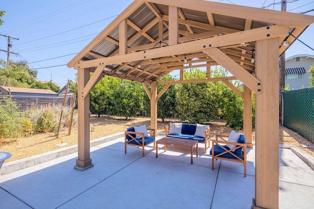 1396 N Ferger Ave, Fresno, CA 93728 - fenced backyard featuring an outdoor hangout area, a patio, and a gazebo