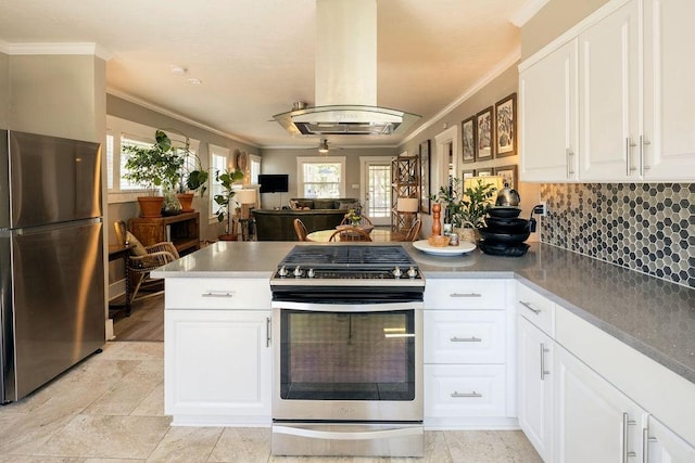 1396 N Ferger Ave, Fresno, CA 93728 - kitchen with stainless steel appliances, a peninsula, ornamental molding, island exhaust hood, and decorative backsplash