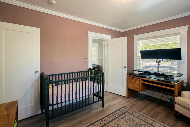 1396 N Ferger Ave, Fresno, CA 93728 - bedroom featuring wood finished floors, ornamental molding, and an office area