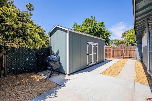 1396 N Ferger Ave, Fresno, CA 93728 - view of shed with a fenced backyard