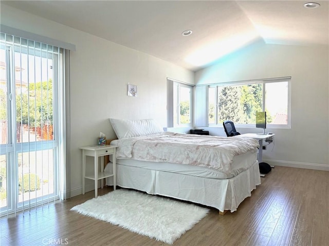 2227 Langspur Dr, Hacienda Heights, CA 91745 - bedroom featuring vaulted ceiling, multiple windows, wood finished floors, an office area, and recessed lighting