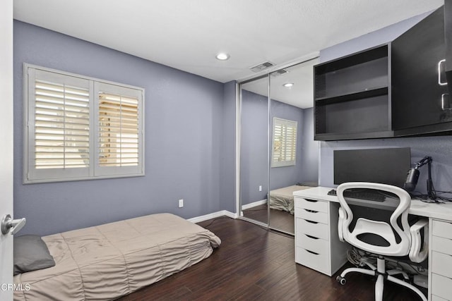 3328 Whispering Palms, Pico Rivera, CA 90660 - bedroom with dark wood-style flooring, a closet, recessed lighting, and an office area
