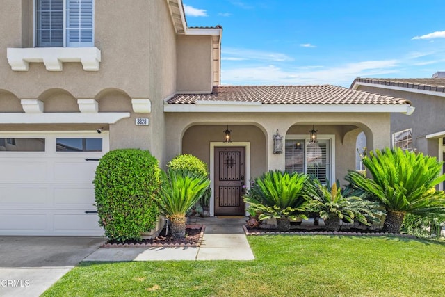 3328 Whispering Palms, Pico Rivera, CA 90660 - view of exterior entry with stucco siding, a tiled roof, and a yard