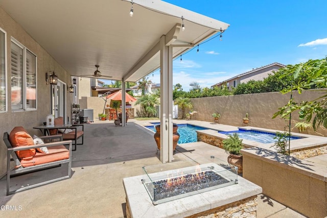 3328 Whispering Palms, Pico Rivera, CA 90660 - fenced backyard featuring an outdoor fire pit and a patio