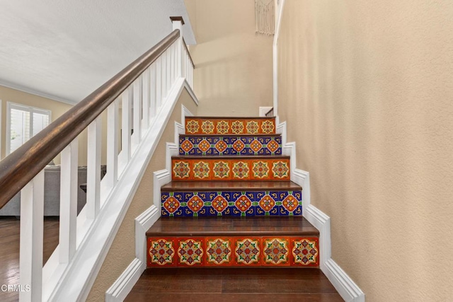 3328 Whispering Palms, Pico Rivera, CA 90660 - stairs featuring wood finished floors and a textured wall