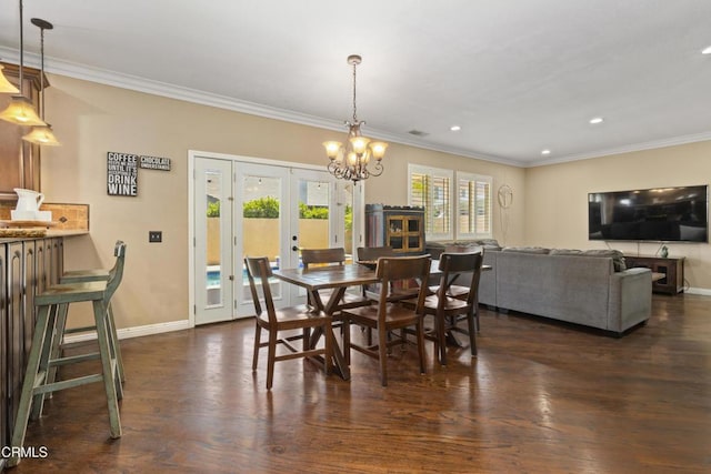 3328 Whispering Palms, Pico Rivera, CA 90660 - dining space featuring french doors, dark wood finished floors, ornamental molding, recessed lighting, and a chandelier