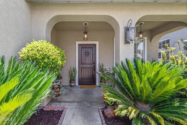 3328 Whispering Palms, Pico Rivera, CA 90660 - doorway to property featuring stucco siding