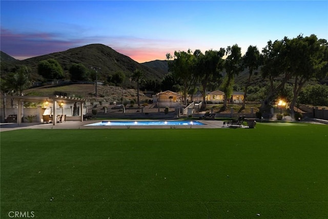 18310 Canon St, Devore, CA 92407 - view of community with a mountain view, a pergola, a yard, and a pool