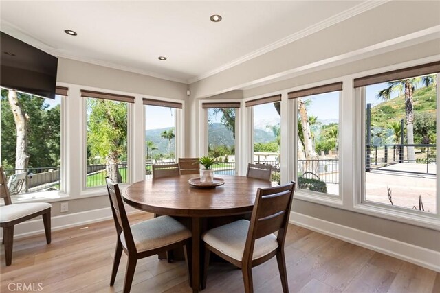 18310 Canon St, Devore, CA 92407 - dining room with crown molding, light wood-type flooring, and recessed lighting