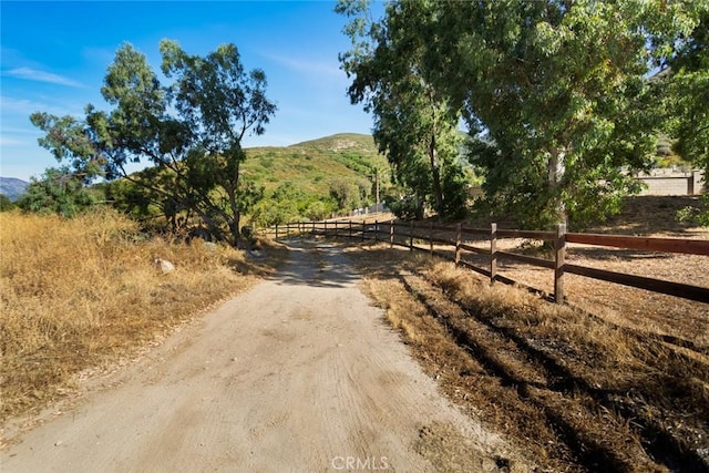 18310 Canon St, Devore, CA 92407 - view of dirt / gravel road with a view of countryside and a mountain view