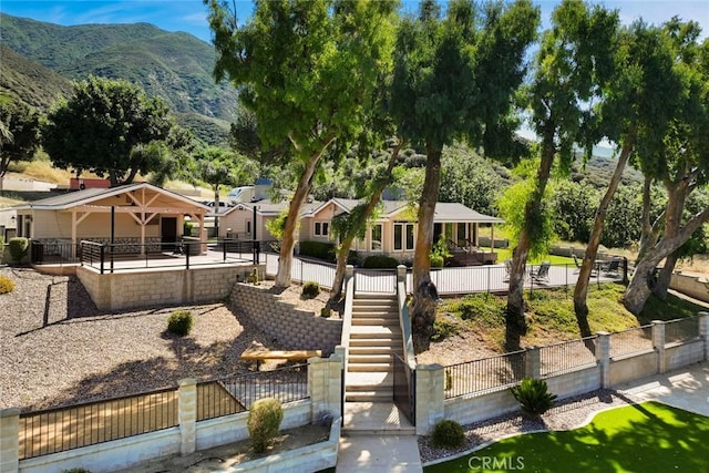 18310 Canon St, Devore, CA 92407 - view of community with a mountain view and stairs