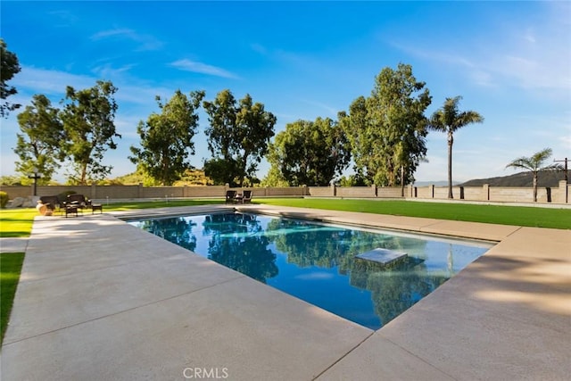 18310 Canon St, Devore, CA 92407 - view of swimming pool with a patio area