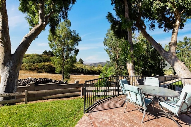 18310 Canon St, Devore, CA 92407 - view of patio / terrace with outdoor dining area and a mountain view