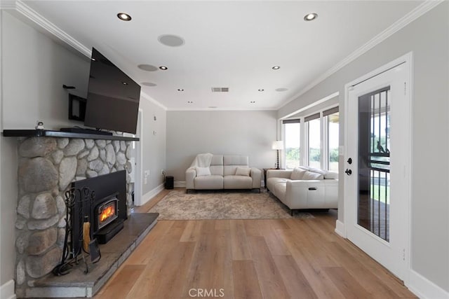 18310 Canon St, Devore, CA 92407 - living room with light wood finished floors, ornamental molding, and recessed lighting